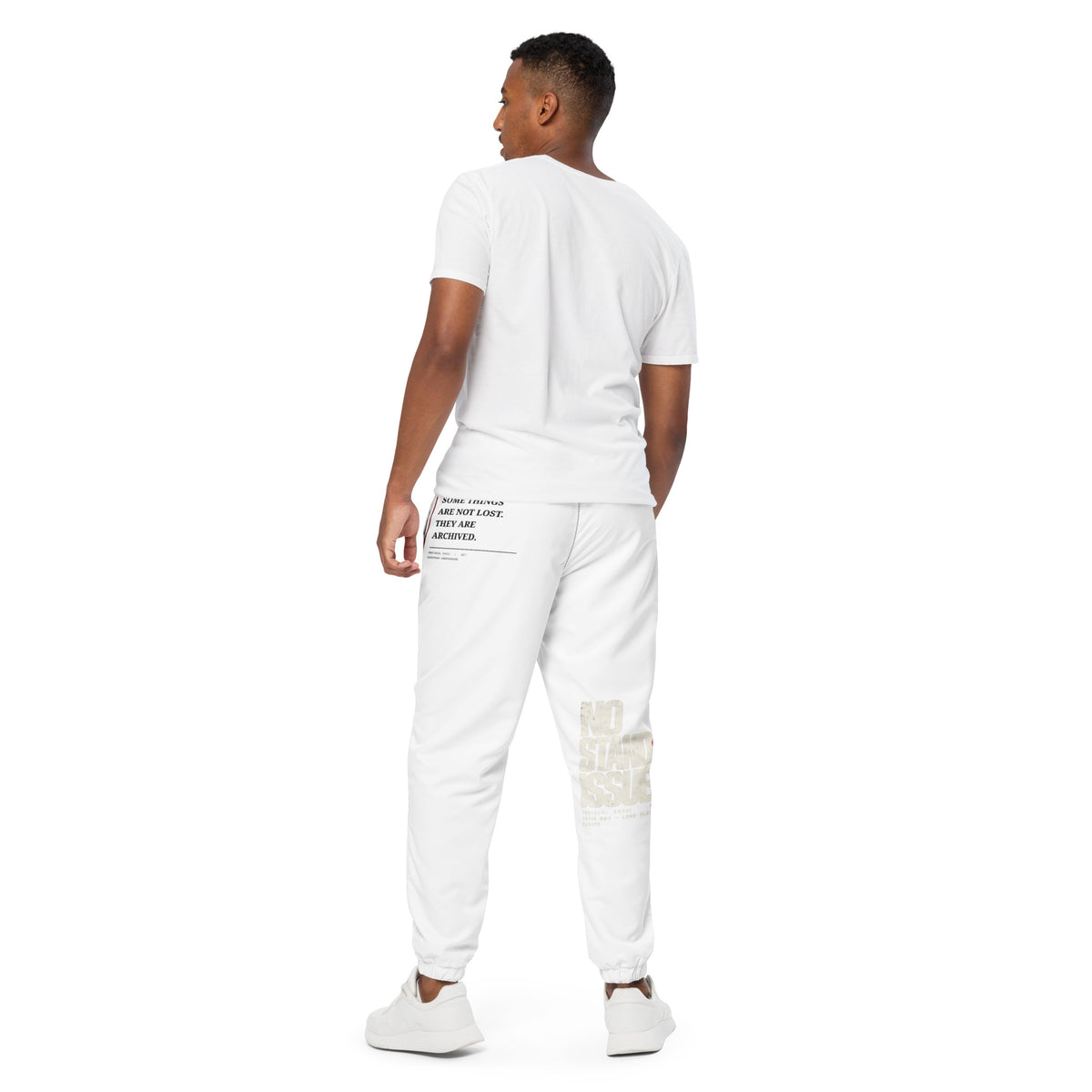 Black technical track pants by PROTOCOL XXVII, back view